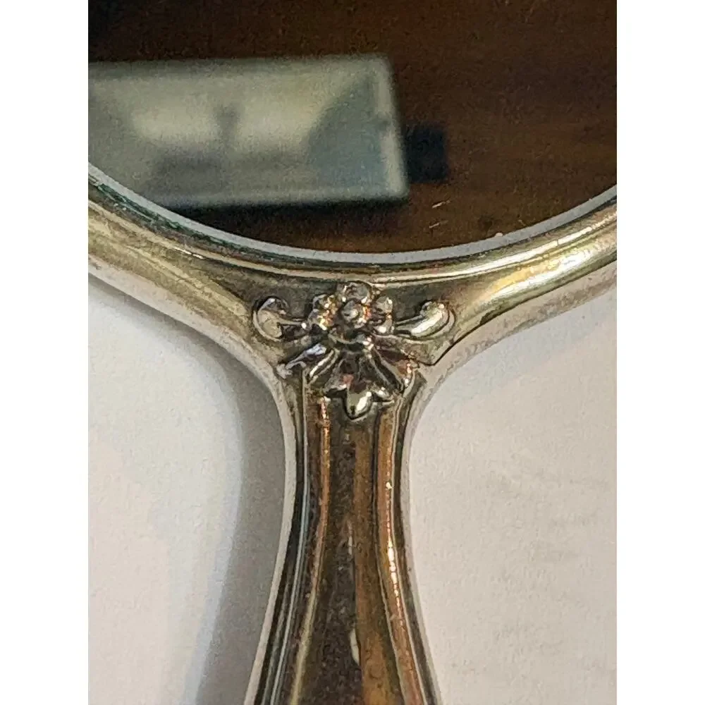 Sterling Antique Handheld Beveled Floral Design